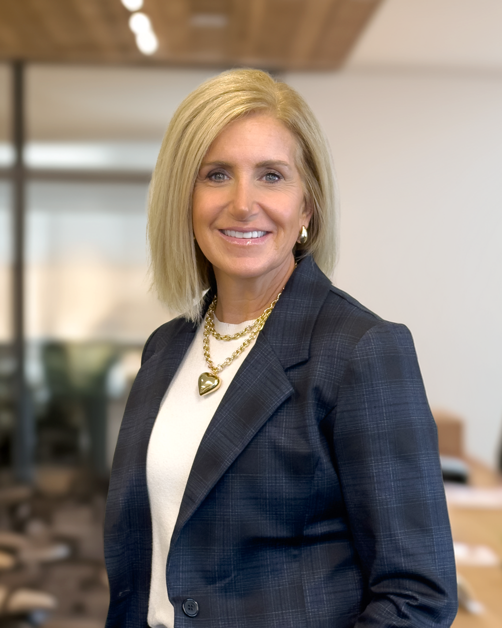 Professional headshot of Chris Kasman, Vice President of Marketing at NAI DESCO.